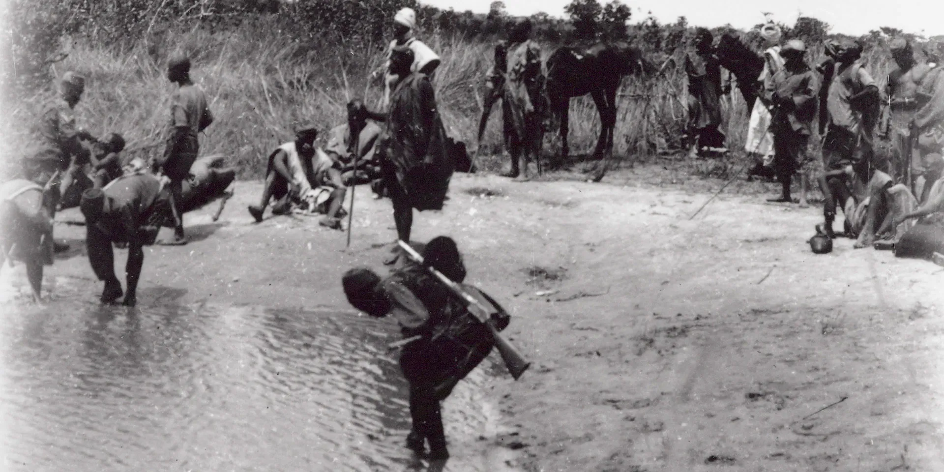 British troops from Cameroon refresh themselves at a river, 1918
