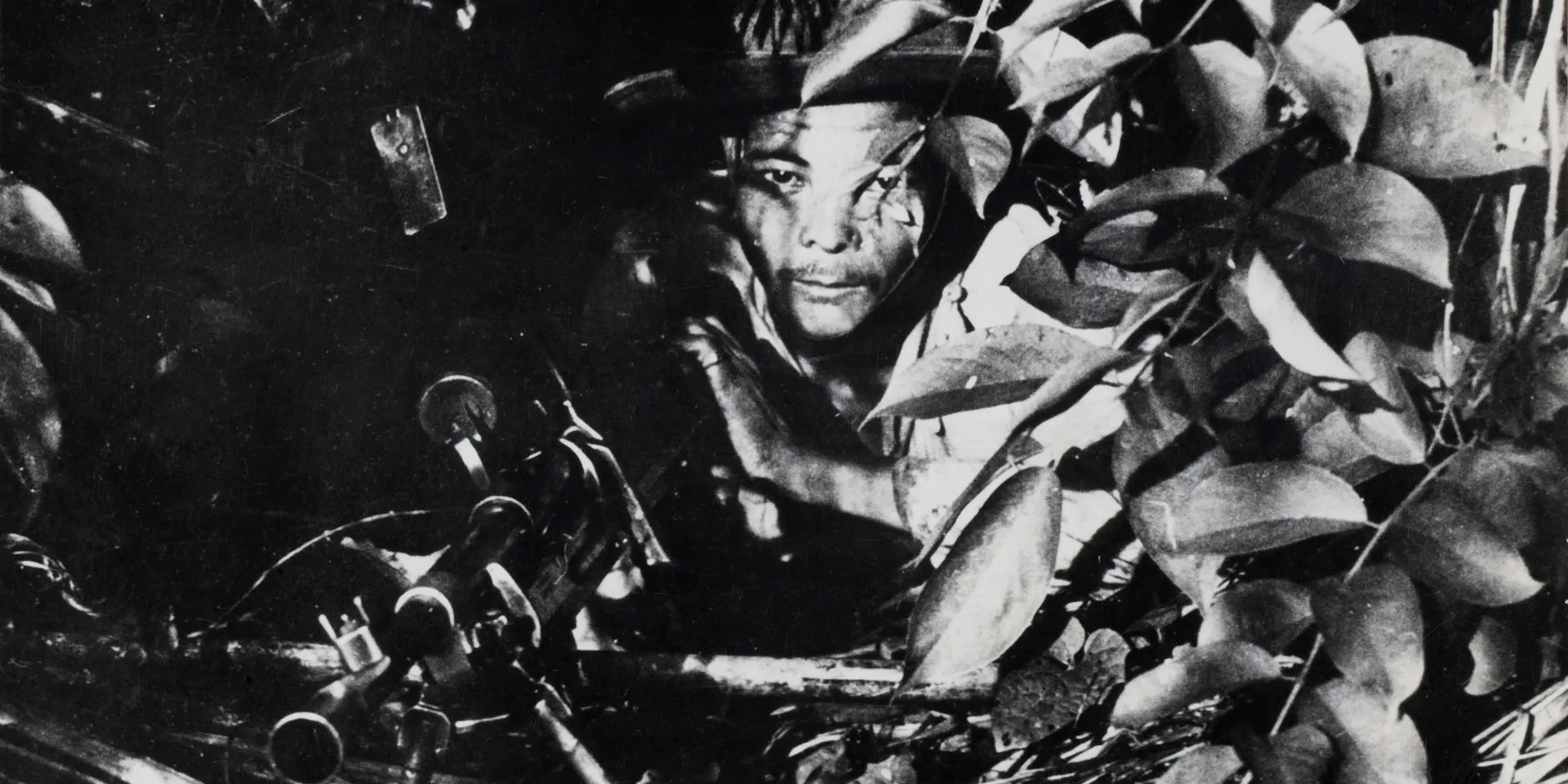 A well-concealed Bren gunner of 7th Gurkha Rifles in the Burmese jungle, c1944 