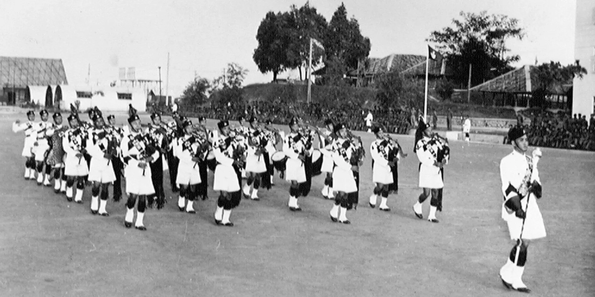 Pipe band of 2nd Battalion, 2nd King Edward VII's Own Gurkha Rifles (The Sirmoor Rifles), Johore, Malaya, 1957