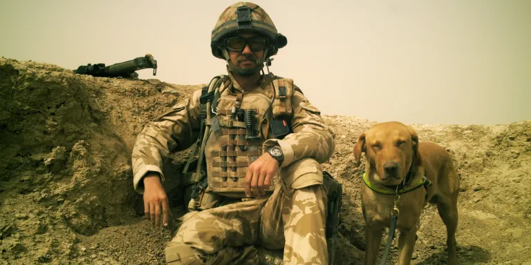 Corporal Robin Ardis and Diesel the search dog in Afghanistan, 2007