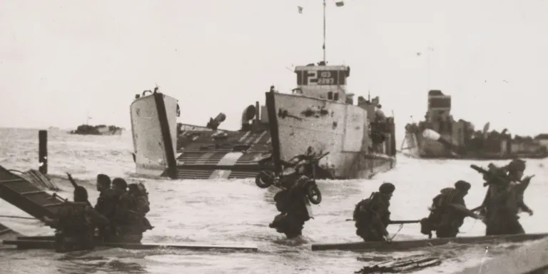 Troops disembarking from a landing craft, 6 June 1944