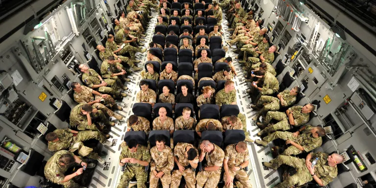 Soldiers on the final leg of their flight to Afghanistan, 2010