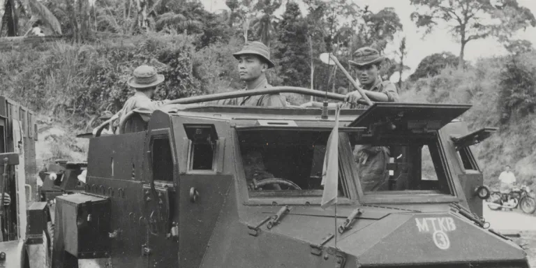 Malayan police in an armoured car, 1952