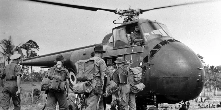 Soldiers boarding a Westland Whirlwind helicopter for a patrol, 1957