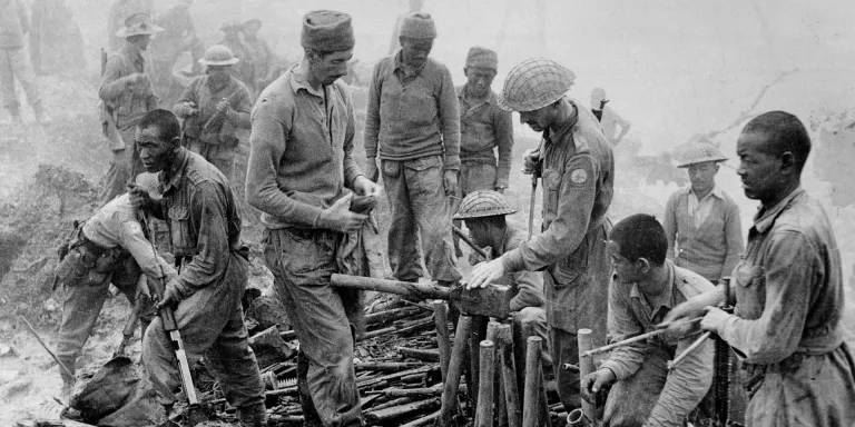 Gurkhas inspect captured Japanese ordnance during the Imphal-Kohima battle, 1944