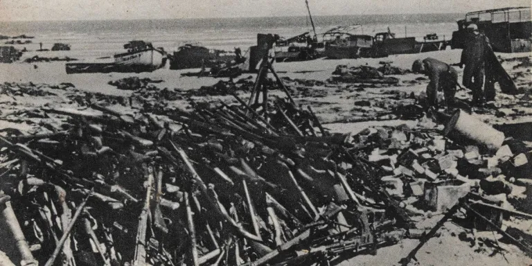 German soldiers collect Allied equipment at Dunkirk, 1940