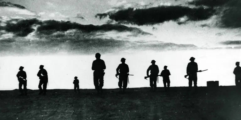 British infantry advancing as darkness falls, El Alamein, 1942