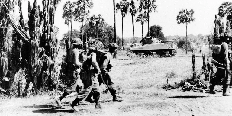 A Sherman tank of the 9th Royal Deccan Horse advancing with the infantry, Burma, 1945 
