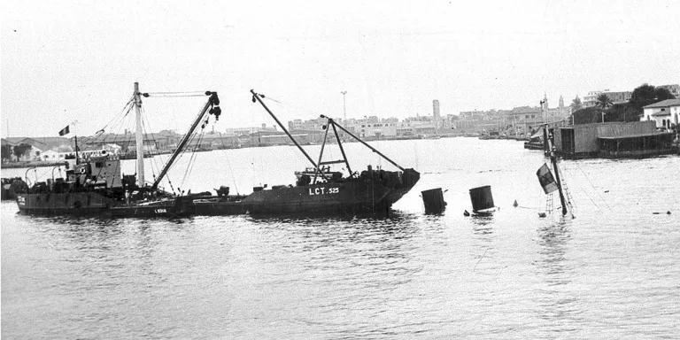 Royal Engineers on a LCT checking sunken shipping blocking the canal, 1956 
