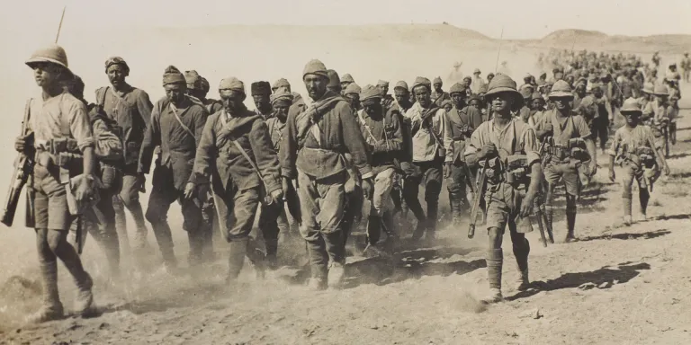 Turkish prisoners escorted by the 1/5th Queen's Own (Royal West Kent) Regiment, Mesopotamia, 1917