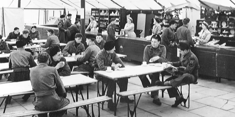 National Servicemen relax in the NAAFI canteen at Weybourne Camp, April 1954