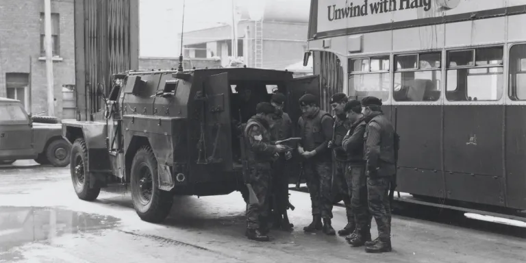 Soldiers of The Royal Regiment of Wales preparing for a patrol in the Ardoyne area of Belfast, 1972