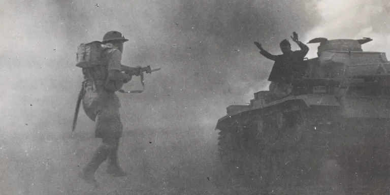 A British infantryman capturing a German tank crewman at El Alamein, 1942