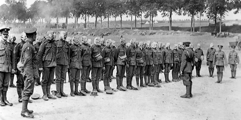 Irish Guards lined up for respirator drill on the Somme, September 1916