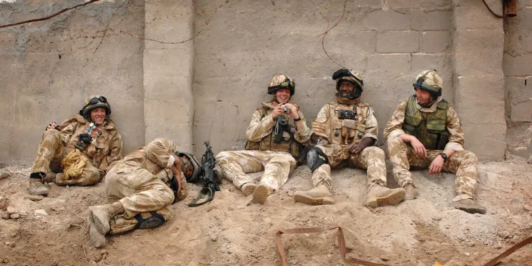 Soldiers of the Royal Green Jackets take a break during Operation Sinbad in Basra, February 2007