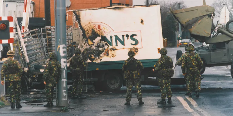 Soldiers of the Ulster Defence Regiment at the scene of a bomb attack, c1990