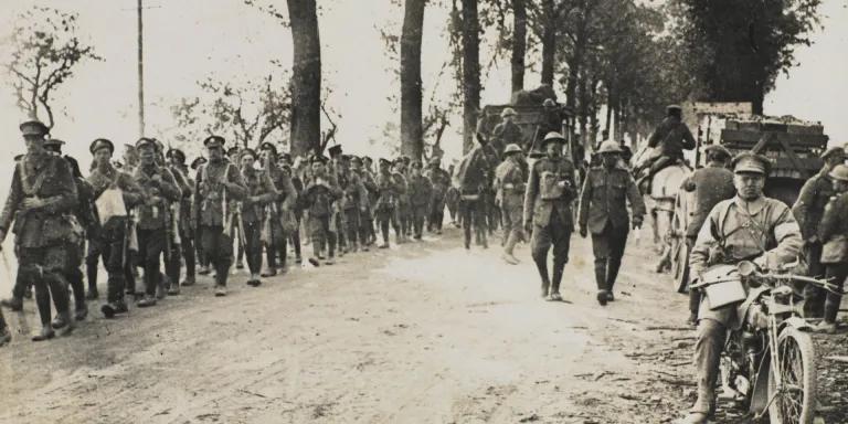 Troops of the Manchester Regiment marching to the front line, July 1918