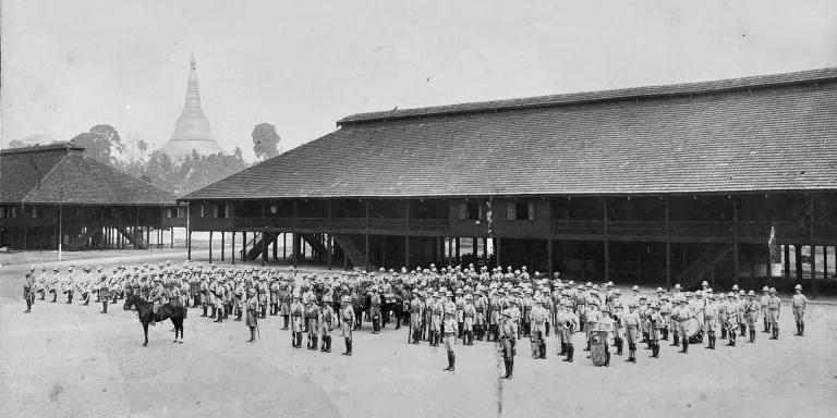 Men of The King's Own Royal Regiment (Lancaster) on parade with mountain artillery, Burma, c1920s