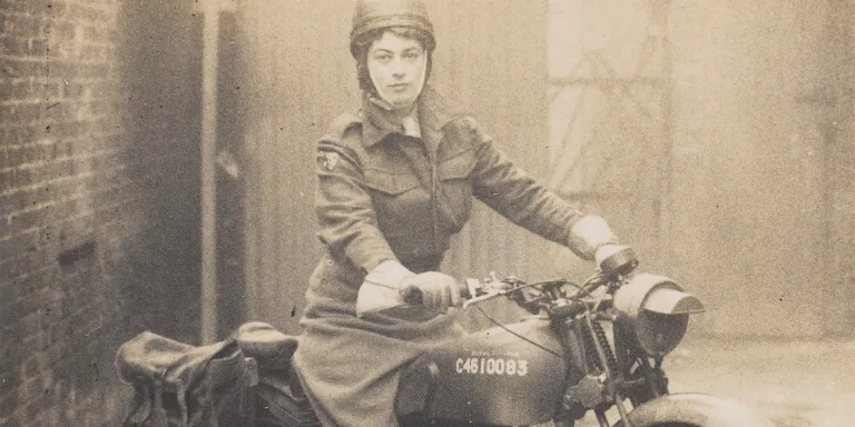 Valerie Erskine Howe, Auxiliary Territorial Service, on a motorbike, c1944