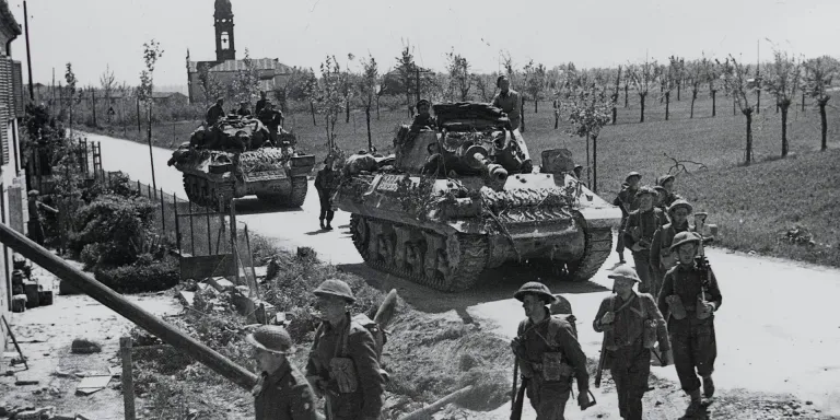 Men of 2nd Battalion, The Lancashire Fusiliers, with Achilles tank destroyers in support, Italy, April 1945