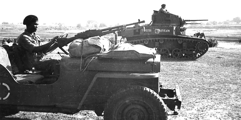 A jeep and light tank of the East African Reconnaissance Regiment in Burma, 1945