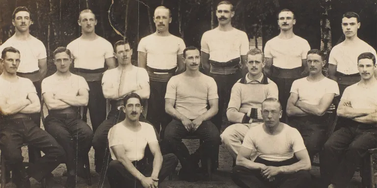 Army Gymnastic Staff instructor (seated centre) with trainees, Aldershot, 1913